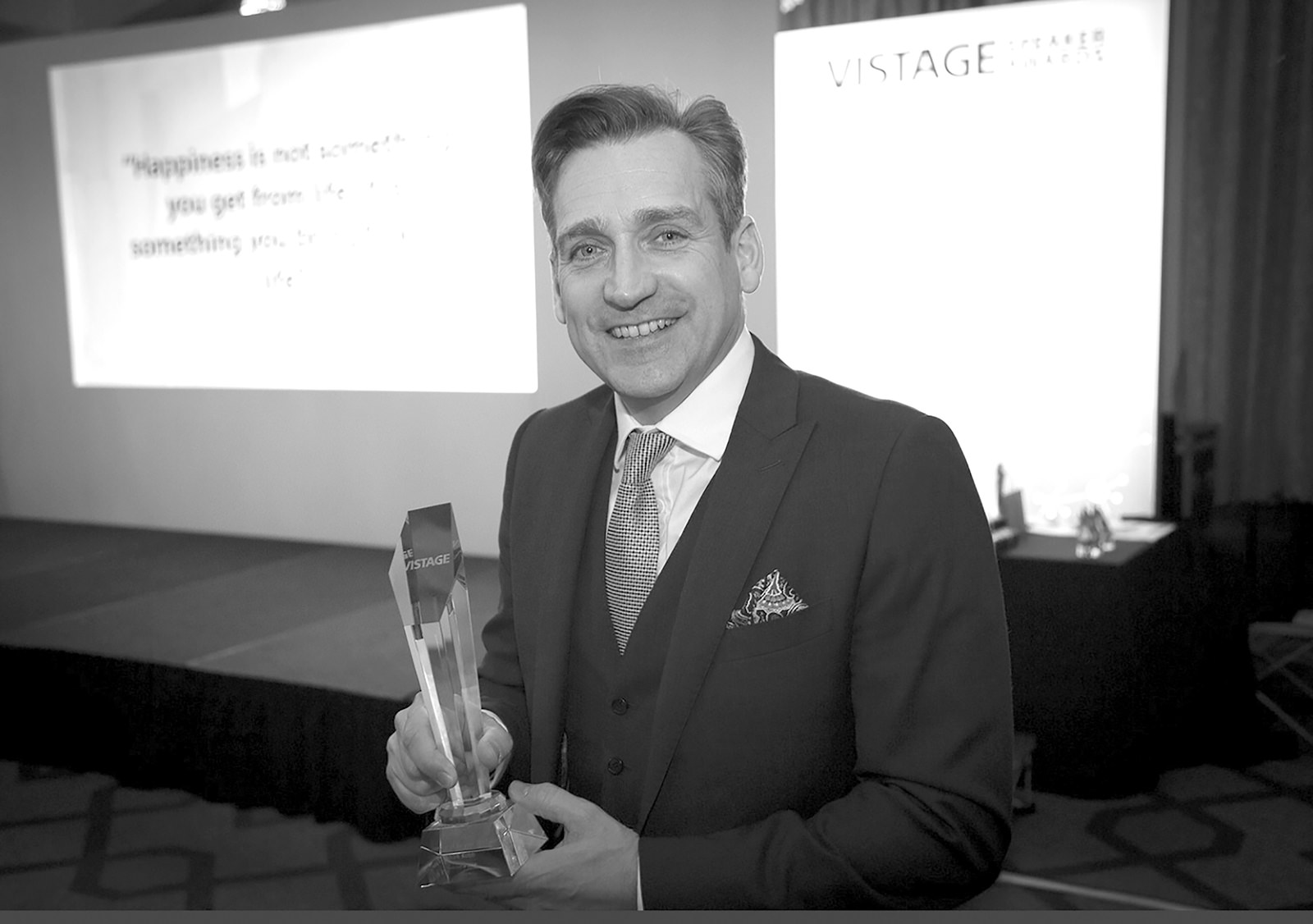 Mark Robb, winning an award